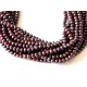 Strand of garnet color pearls